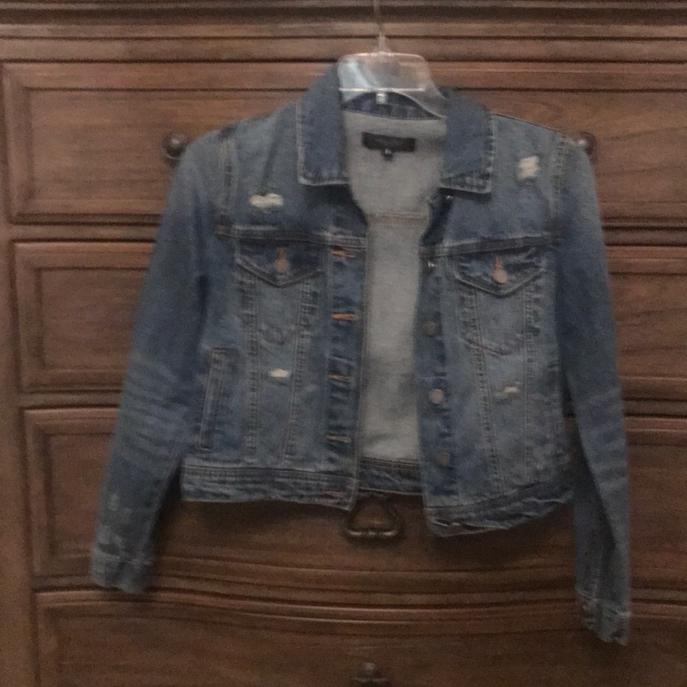 Mid cut jean jacket. Brand new